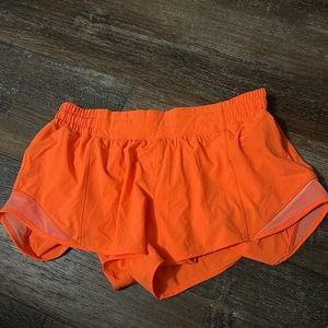 lululemon highlighter orange high rise hotty hot shorts